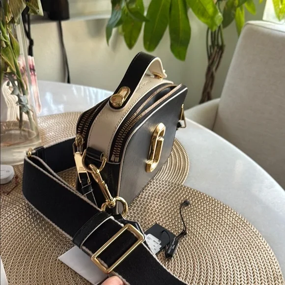 Marc Jacobs Black and Gold Crossbody Bag with Chic Elegance